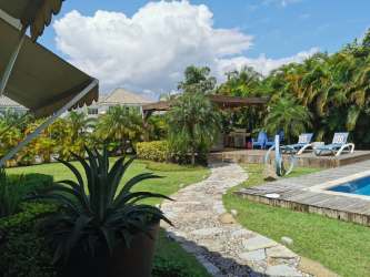 Modern kitchen with granite island, high-end appliances beach property Bijao Santa Clara Panama