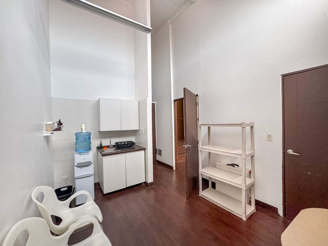 Open office space with high ceilings, partition work areas and natural light in commercial building San Francisco