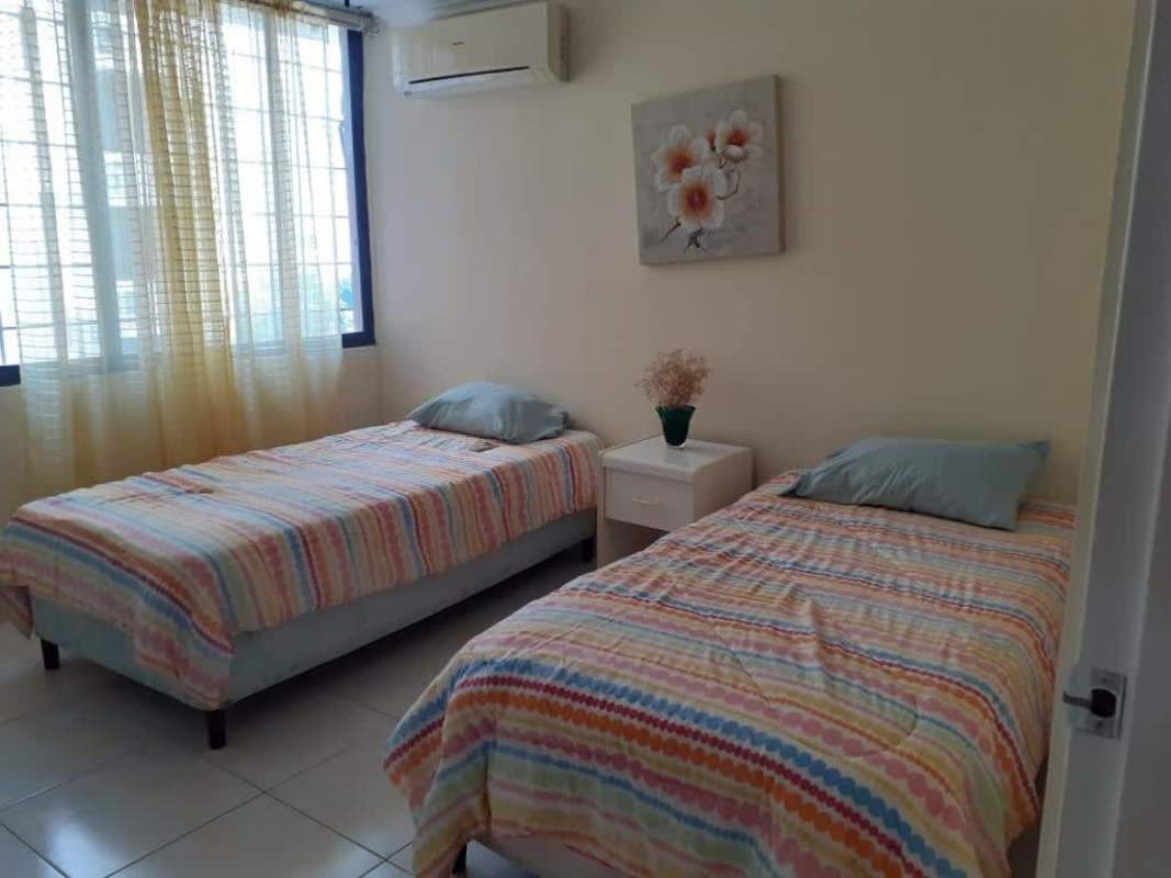 Modern living space with sofas and city view window PH Torre Ebelle Bella Vista Panama City