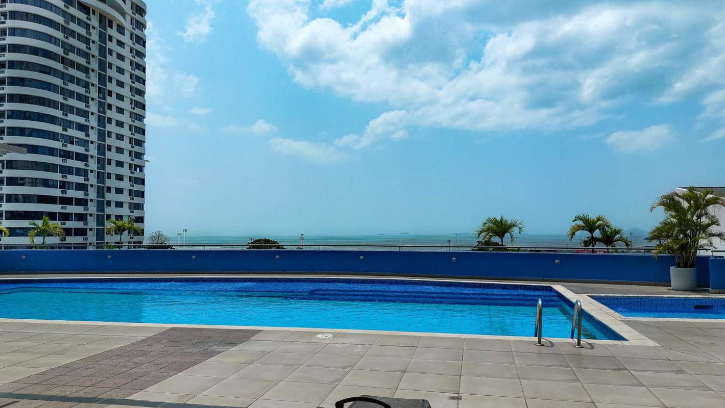 Rooftop swimming pool overlooking ocean skyline PH Cabomarzo Panama