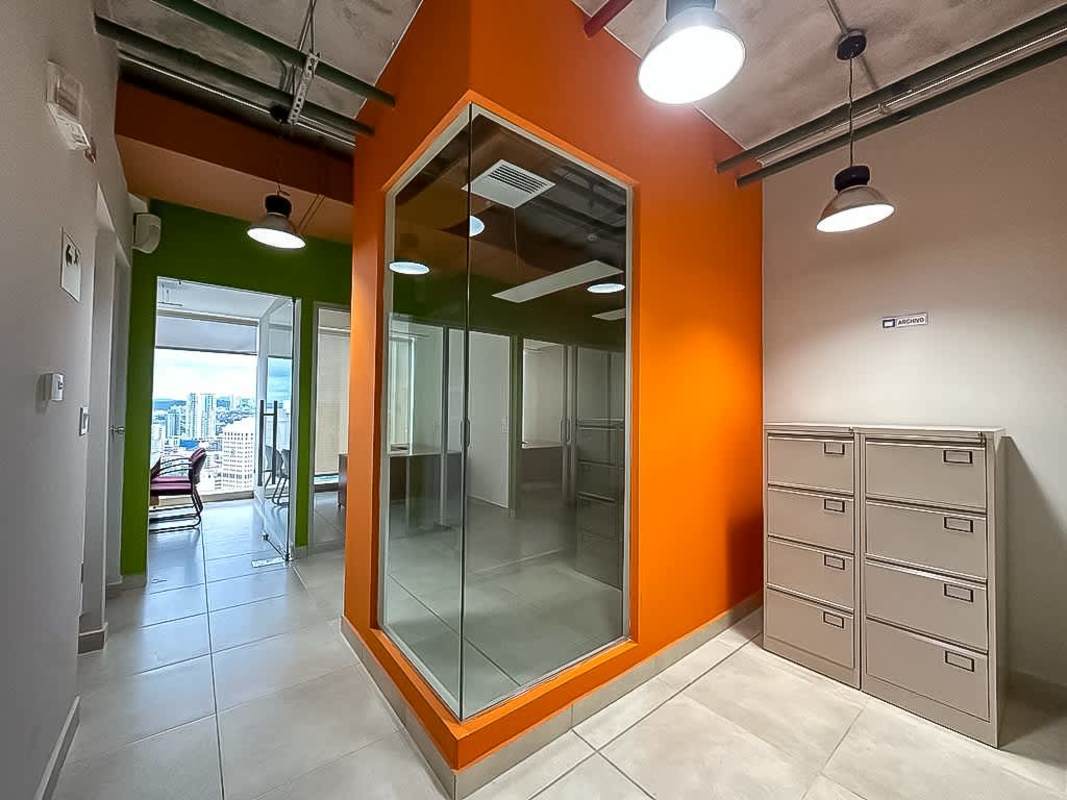 Private office space with floor-to-ceiling window, city skyline view in Obarrio Panama