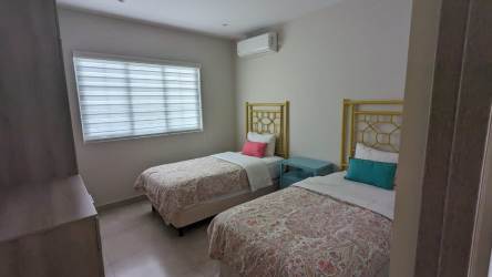 Balcony view overlooking golf course from master bedroom in PH Bijao Beach Panama