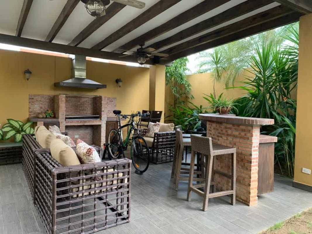 Elegant dining room with bar area, large window, marble floor Antigua Costa del Este Panama