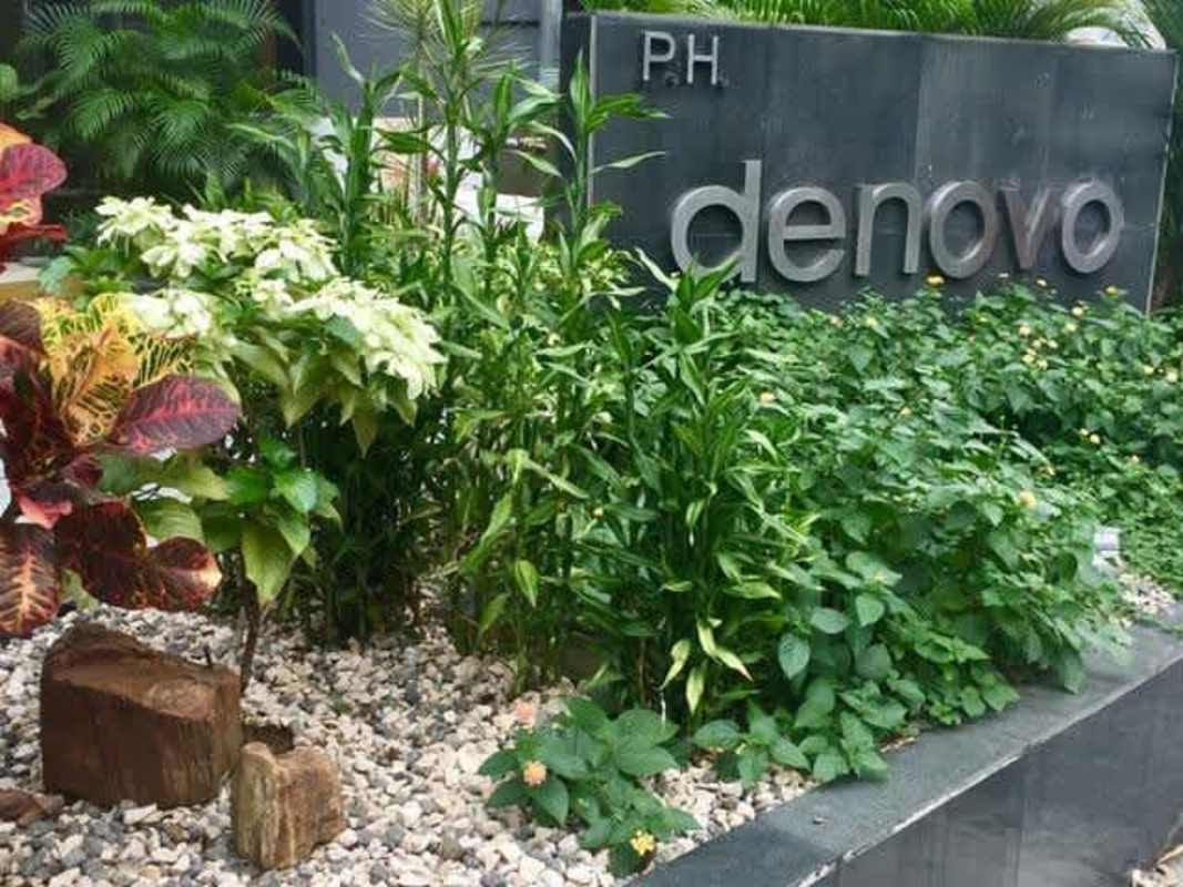 Landscaped garden and PH Denovo entrance sign Panama Obarrio