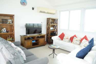 Contemporary kitchen with granite countertops in beachfront penthouse PH Barcovento San Carlos Panama