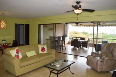 Contemporary kitchen with granite countertops, appliances and wood cabinetry Punta Barco