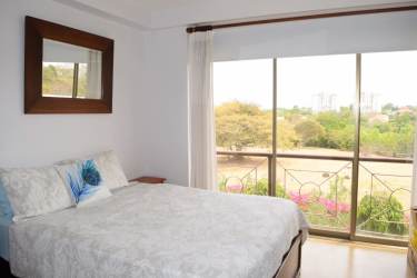 Large living room open to terrace with ceiling fan and ocean breeze, Punta Barco Resort Panama