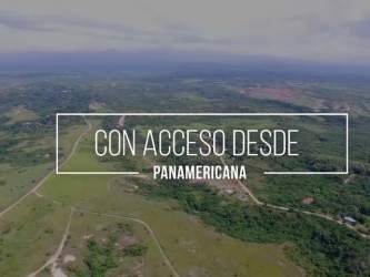 Aerial view showcasing land plots with road access near Santa Clara Panama