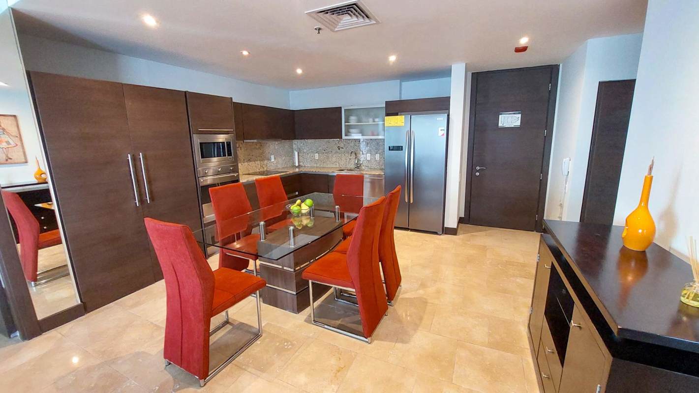 Kitchen with granite counters and dining area JW Marriott Panama
