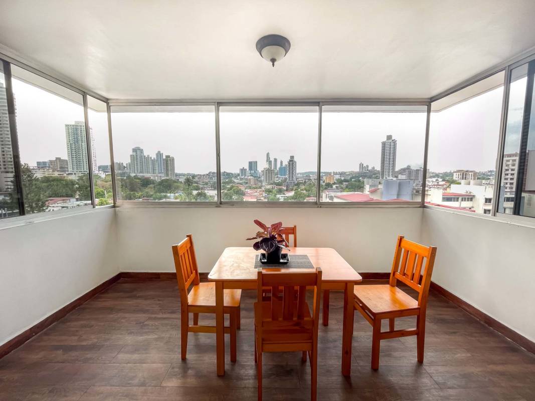 Expansive tiled balcony with panoramic city view in PH Residencial El Carmen Panama City