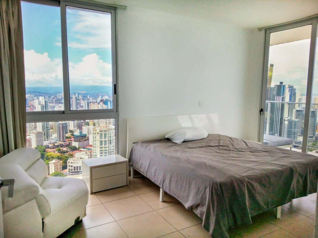 Spacious walk-in closet with built-in shelving at PH White Tower Avenida Balboa