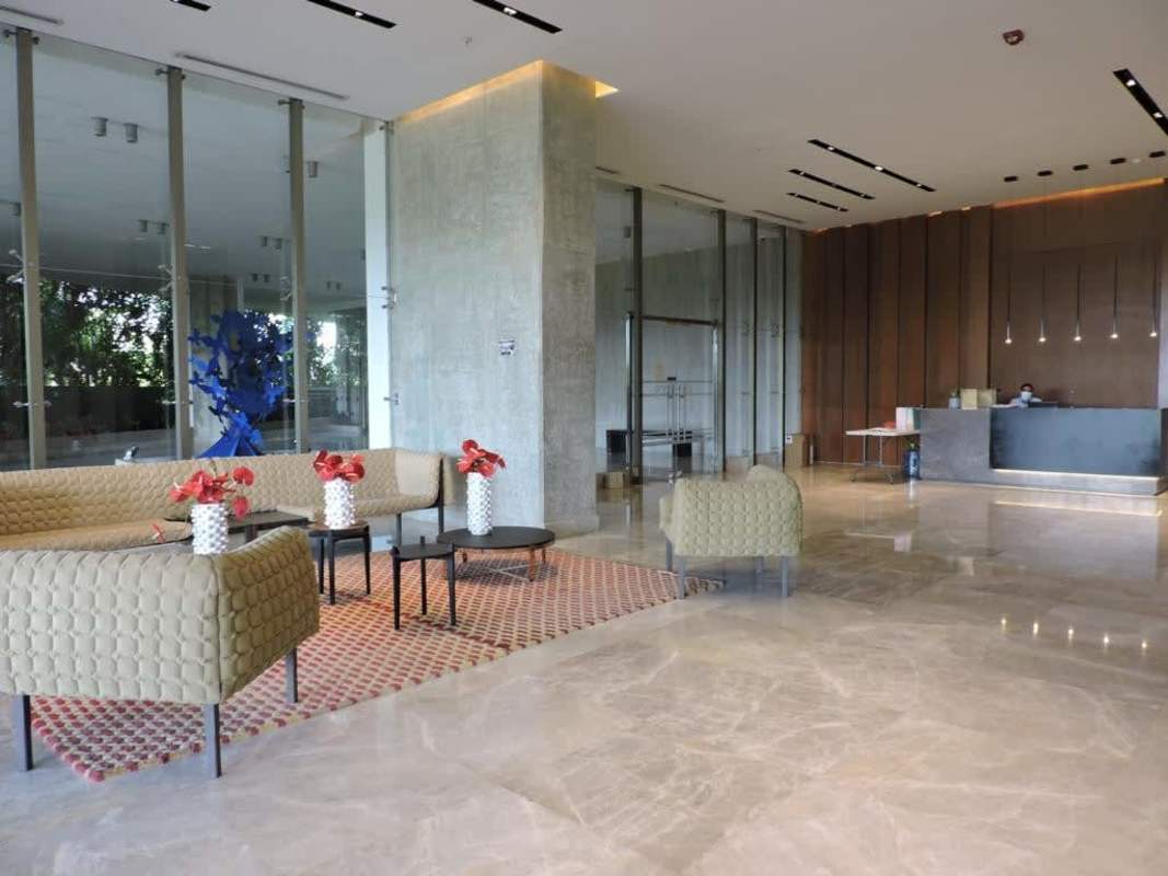 Spacious bedroom with panoramic window and golf course views in PH Greenview Residences Santa Maria Panama