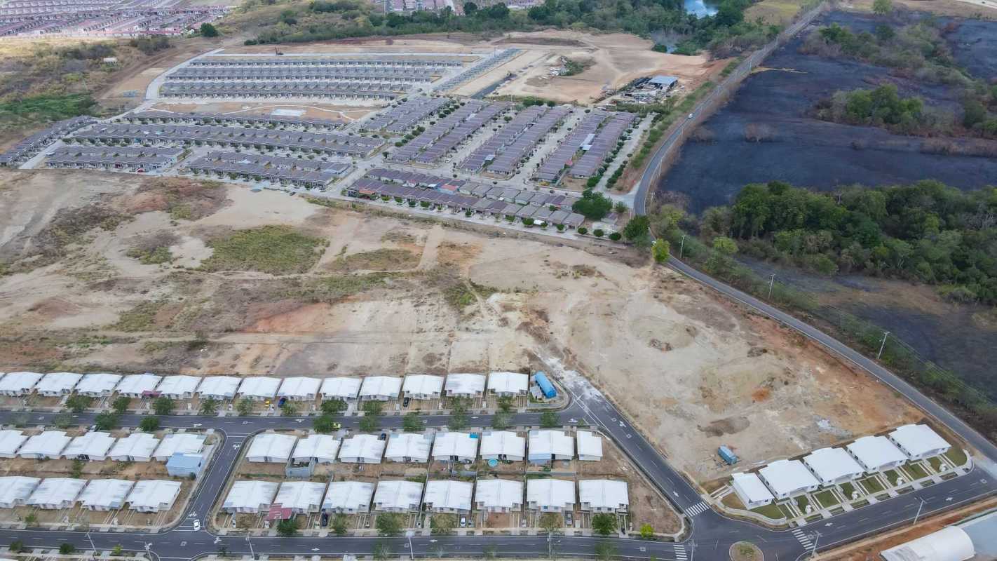 Large undeveloped parcel surrounded by greenery and new houses in Pacora Panama