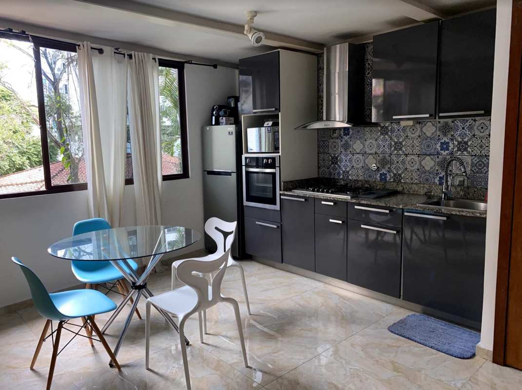 Bedroom with tiled floor, wardrobe, window in La Cresta Panama apartment