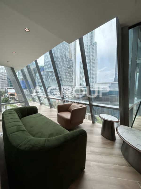 Corporate lounge with glass panorama, city views, modern sofa and tables in Financial Park Tower Panama