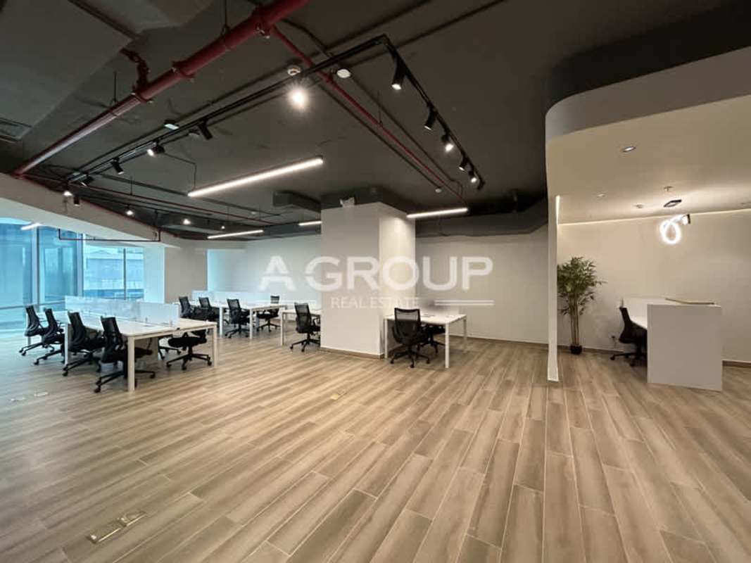 Spacious meeting room with glass walls, large table, modern lighting in Financial Park Tower Panama City