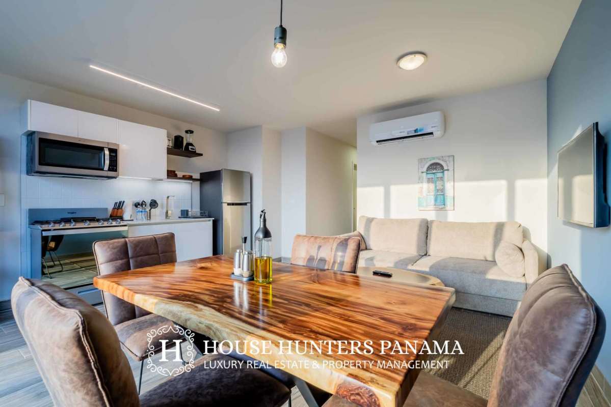 Modern minimalist kitchen with marble floors and appliances in PH Casco View Santa Ana Panama