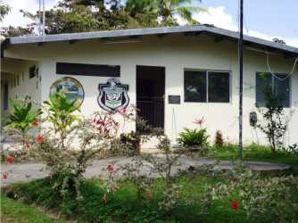 Suspension bridge over river waterfall surrounded by dense mountain forest Altos del María
