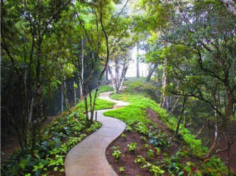Mediterranean gazebo in lush landscaped park inside Altos del María Panama