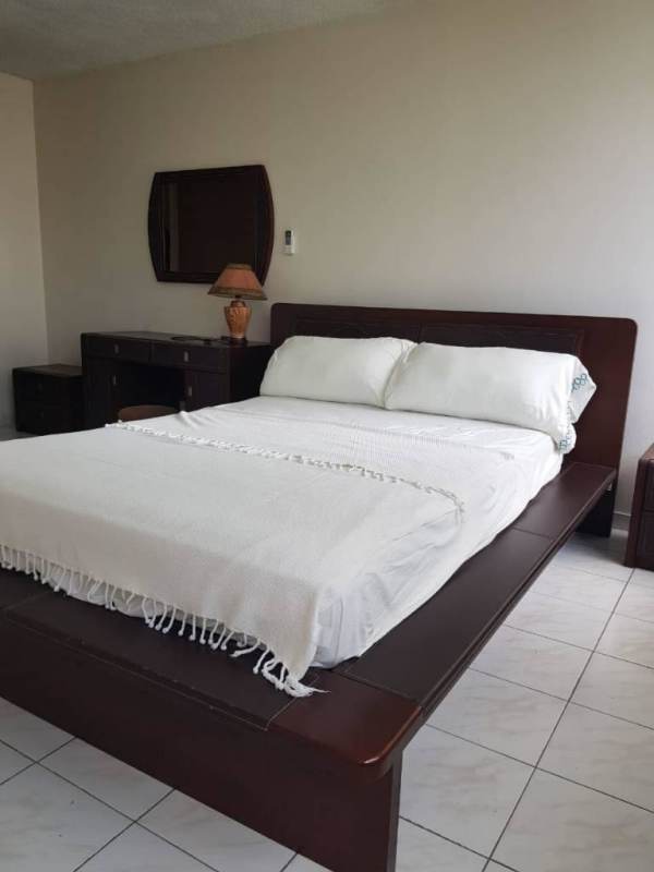 Contemporary living room with sofas, entertainment unit in Horizonte Tower El Cangrejo Panama