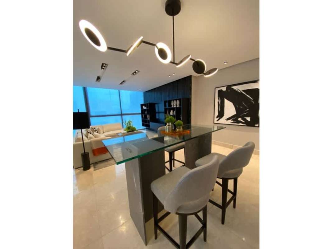 Elegant bathroom with modern design, double vessel sinks, large mirror in PH Deluxe Residences Paitilla