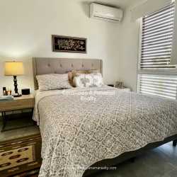 Private covered terrace and green garden fenced yard in PH Las Islas Punta Barco