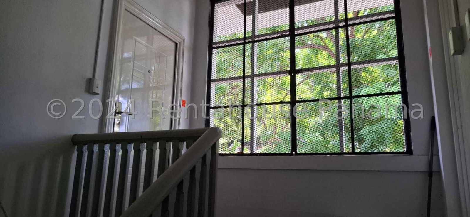 Ceramic tile sitting room with windows, bright space in garden apartment Clayton Panama