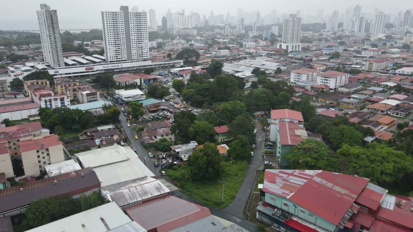 Aerial with mixed industrial and housing surroundings land sale Rio Abajo Panama