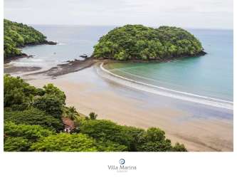 Aerial view secluded tropical beach green islands calm ocean Villa Marina Venao