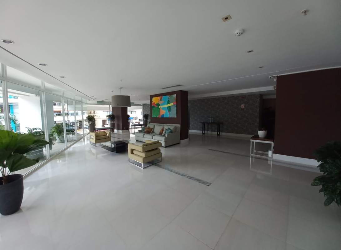 Bright living room with access to balcony panoramic city view PH Tee One Panama City