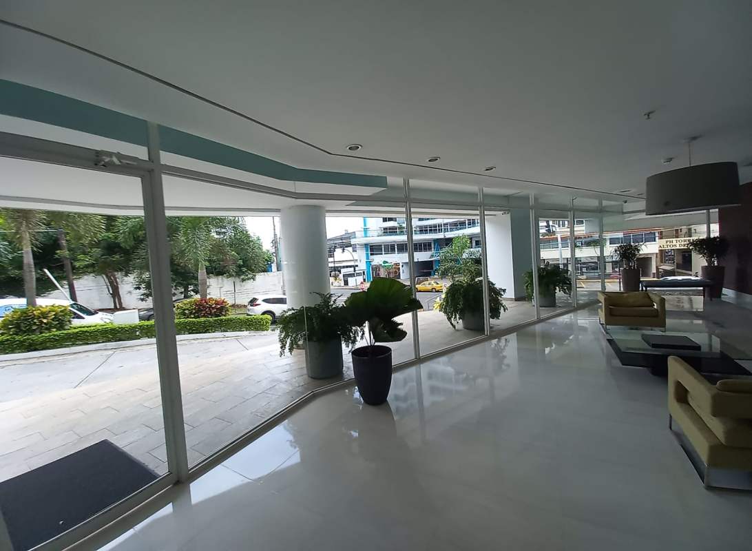 Spacious living area with panoramic windows and balcony PH Tee One Panama City