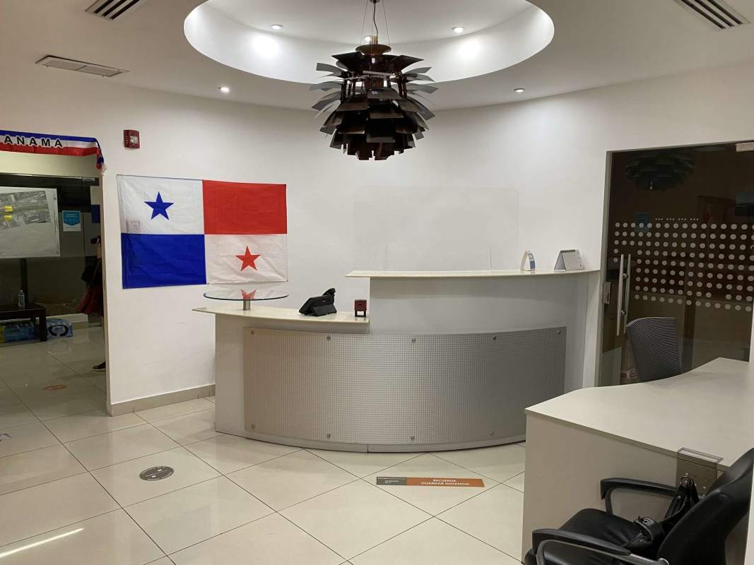 Spacious corporate area with cubicles and glass partitions at PH Ocean Club in Panama