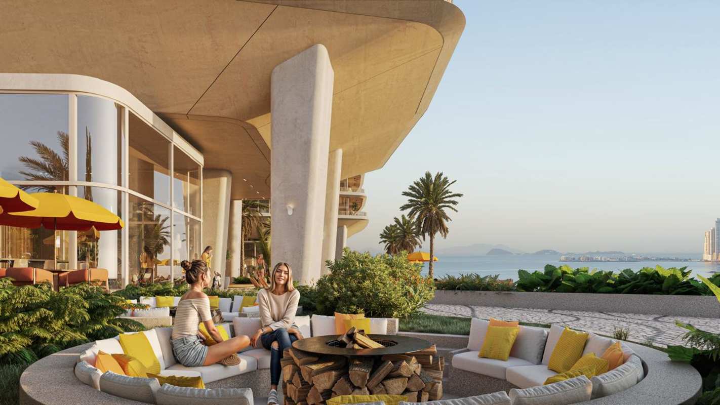 Panoramic aerial image of PH Ipanema twin towers waterfront in Costa del Este with bridge and greenery