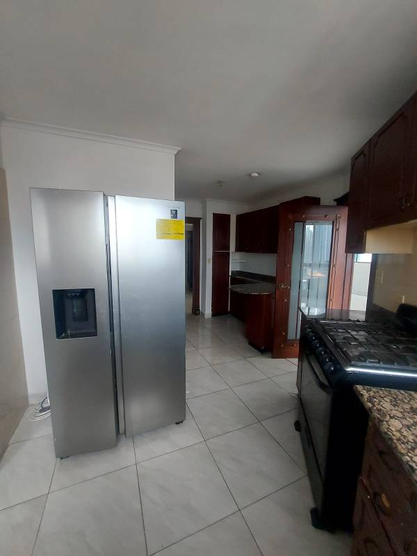 Traditional kitchen granite countertop wood cabinets PH Marbella Tower Panama City