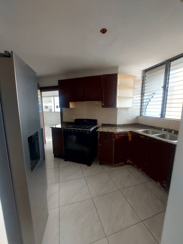 Spacious master bedroom tile floors closet large window PH Marbella Tower Panama