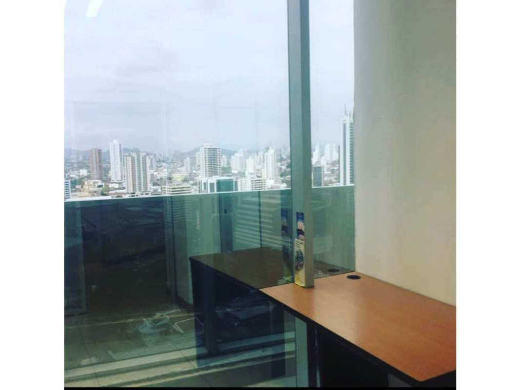 Corner office with wrap-around city skyline views at PH F&F Tower Calle 50