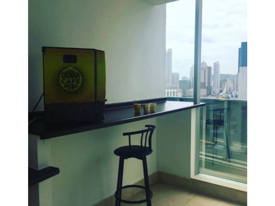 Reception counter with glass walls and meeting area in modern equipped office at F&F Tower