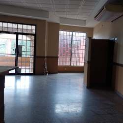 Retail showroom area with glass block windows and sliding glass door in Costa Verde La Chorrera Panama