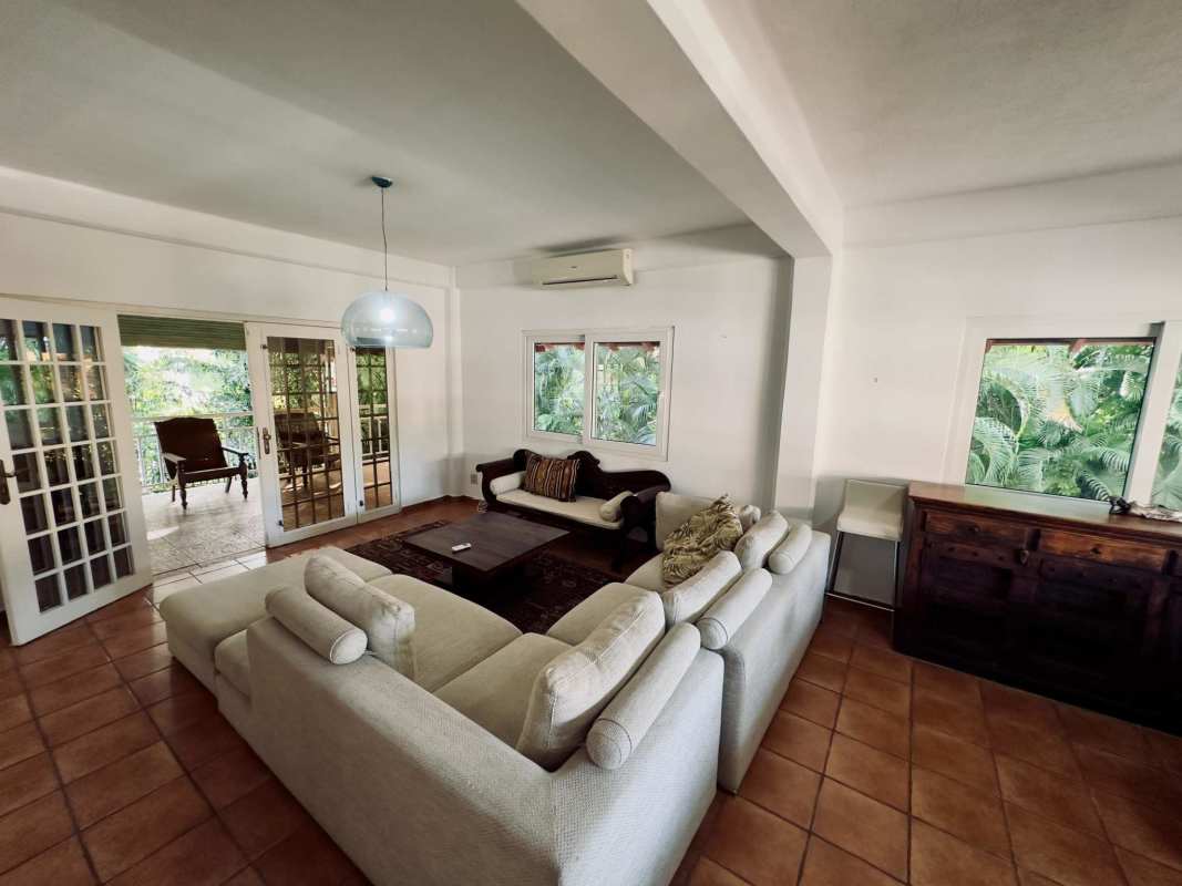 Bedroom with built-in closet air conditioning tile floors in Clayton Panama