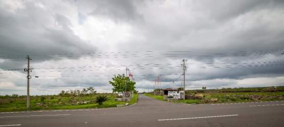 Entrance gate to development parcel in Alto Boquete with access road