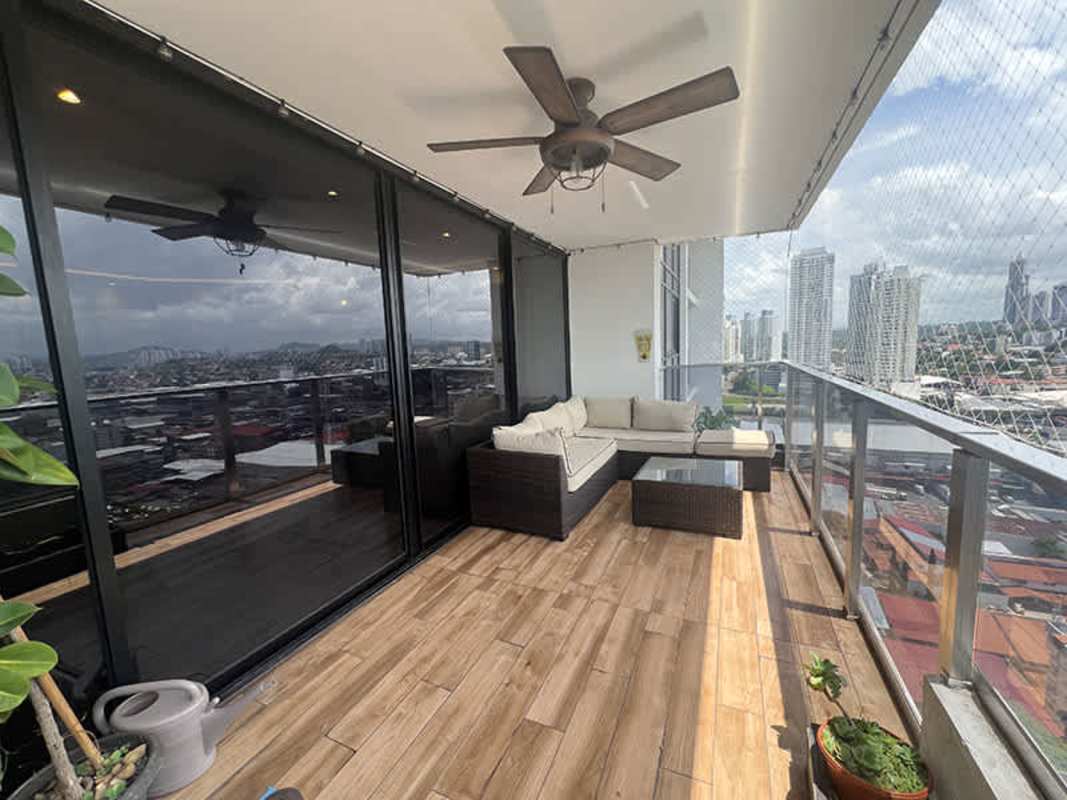 Open concept living and dining space in remodeled Carreras Tower apartment El Cangrejo