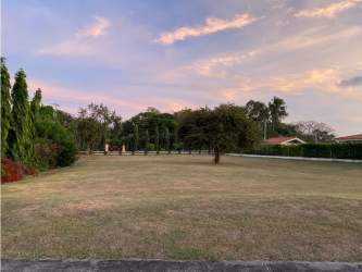 Open residential land with mature landscape inside Punta Barco Village near Coronado Panama