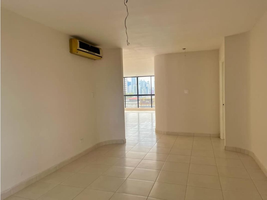 Empty living area with window, split AC and tiled flooring at PH Terrazas del Cangrejo Panama City