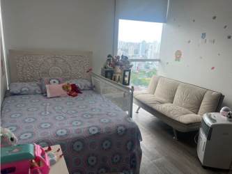 Loft with double height floor-to-ceiling windows overlooking Pacific Ocean in Punta Pacífica