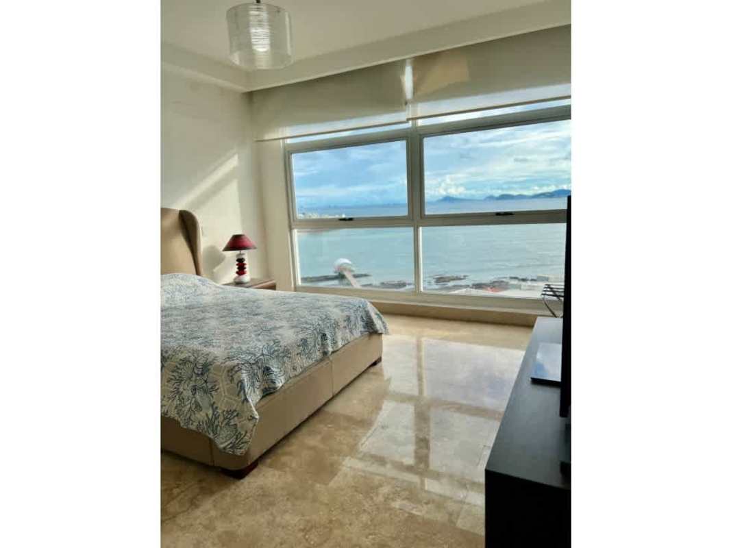 Wide marble floored hallway with recessed lights at PH Q Tower luxury condo