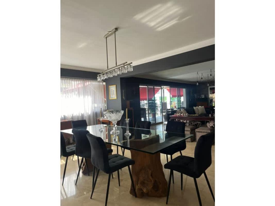 Spacious living room with accent wall, contemporary lighting in PH Troy Panama City