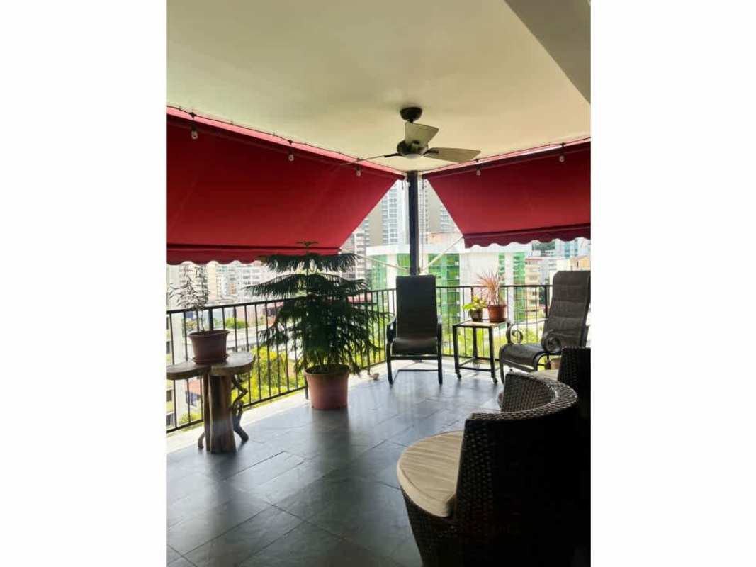 Open kitchen with granite countertops, island, modern cabinetry at PH Troy El Cangrejo