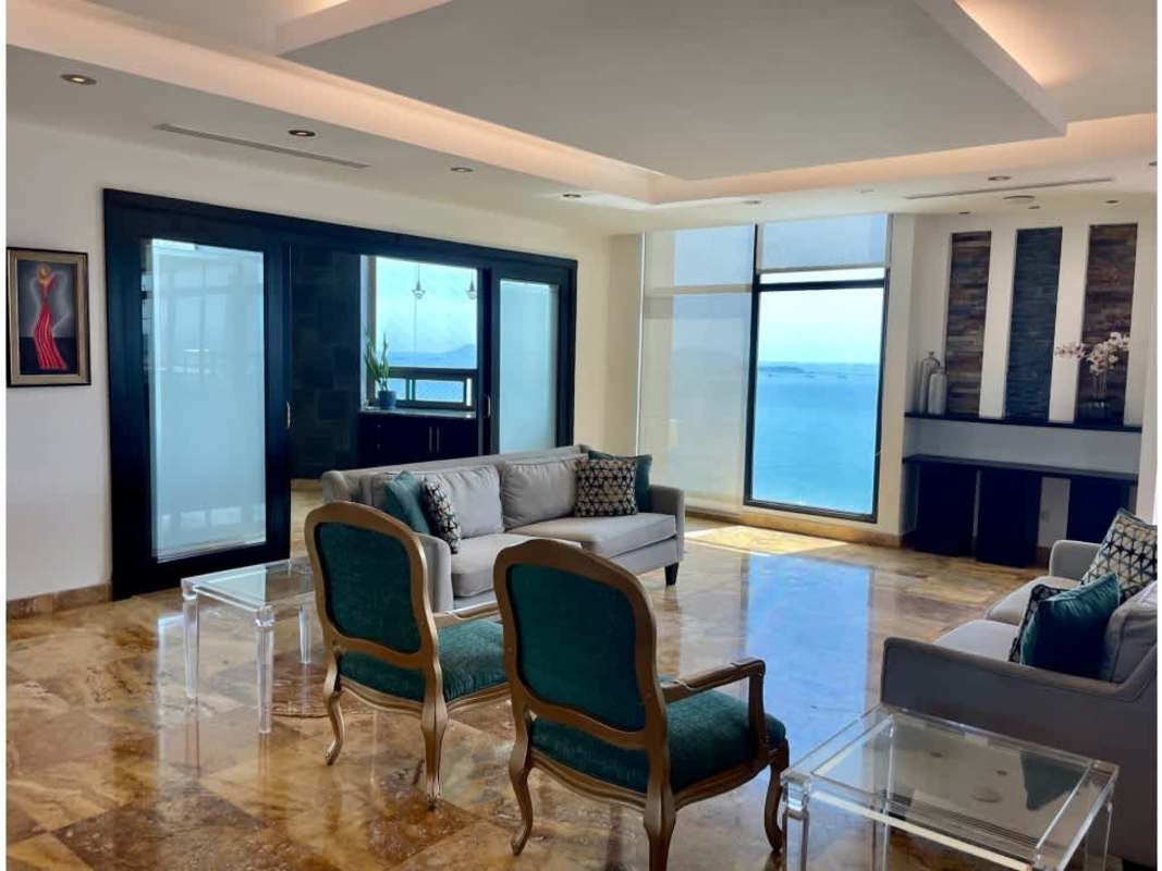 Bathroom with bathtub, glass shower, double sink and ocean views in PH Ocean Park