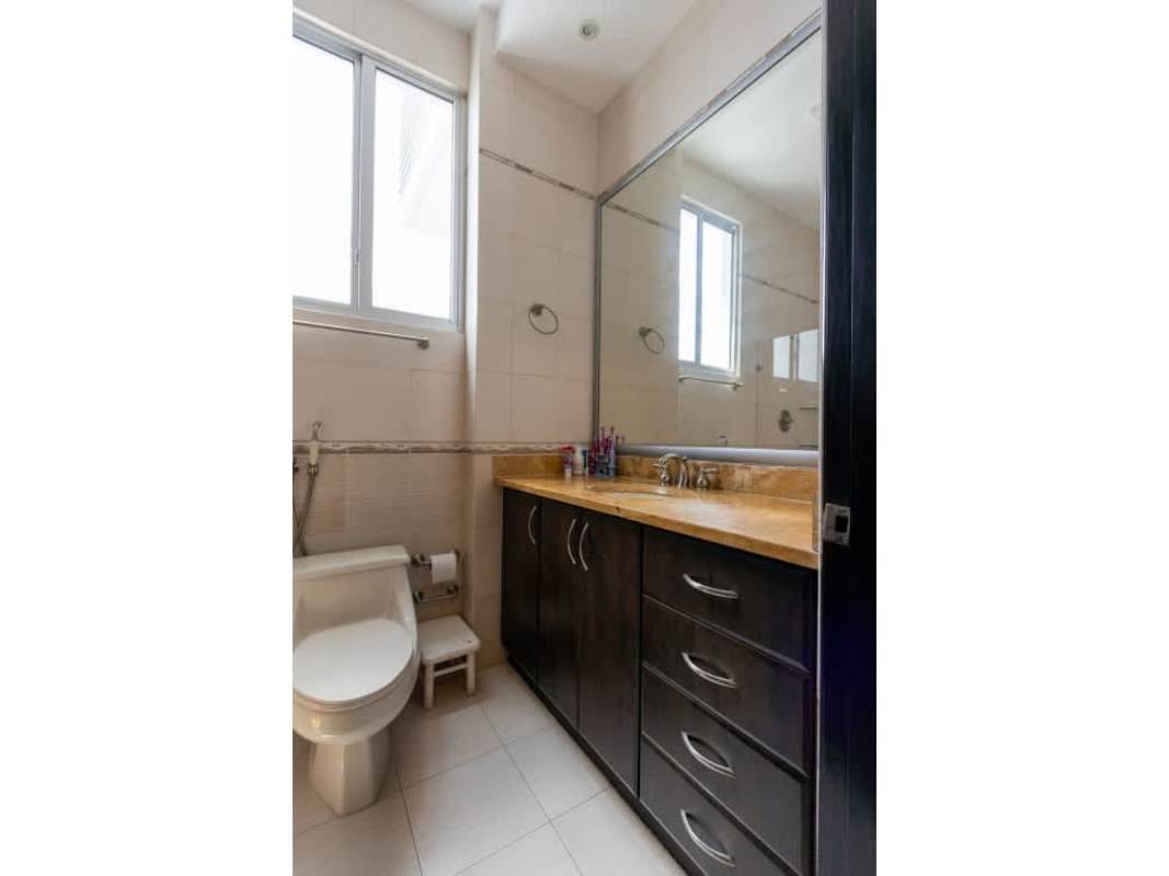 Spacious kitchen with granite tops and built-in appliances in Ocean One Panama