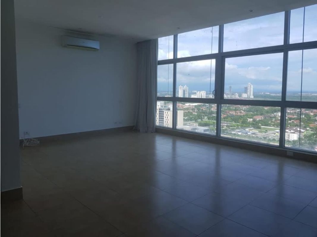 Large open-plan living room with marble floors, recessed ceiling, and panoramic windows PH Ten Tower